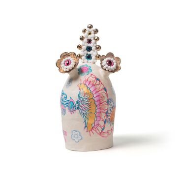 White ceramic sculpture with painted drawings and mixed media assemblage.