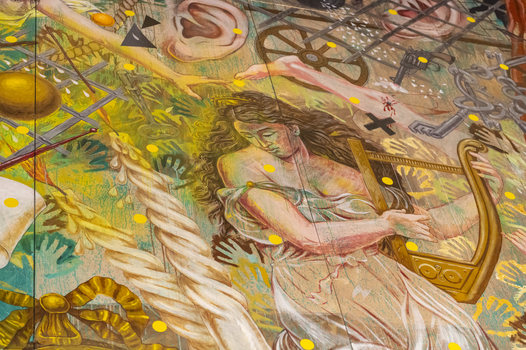 An image of a woman playing the harp 