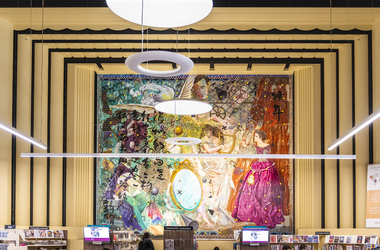 A large colourful mural in a library 