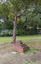 A brick sculpture set amongst gumtrees 
