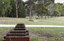 A brick sculpture set amongst gumtrees 