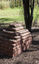 Brick sculptures installed among sheoaks.