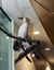 Three cormorant sculptures on a metal pole 