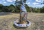 A large scale mosaic fish sculpture in a public park. 