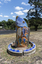 A large scale mosaic fish sculpture in a public park. 