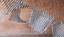 Hanging geometric forms in an entrance foyer