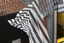 Hanging geometric forms in an entrance foyer