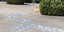 Pavers in a public space featuring a stylised flock of birds