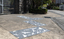 Pavers in a public space featuring a stylised flock of birds