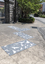 Pavers in a public space featuring a stylised flock of birds