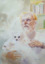 A portrait of Activist John Englart holding his two chihuahuas