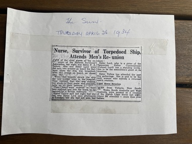 Photocopy of newspaper article headlined "Nurse, survivor of torpedoed ship, attends men's re-union" - handwritten notes with title of publishing newspaper and date of article.