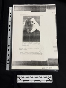 Photocopy of the page and part of the next from a book.  The main page has a large portrait style photograph of a woman in a circa WWII nurses uniform and whimpole with a caption and other text also on the page.
