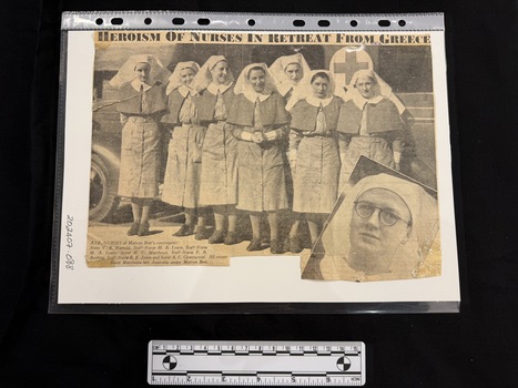 Newspaper clipping with large photograph of eight women in nurses uniforms and a photograph of another woman inset to the bottom right of the large photograph.  Also title of article and caption of large photograph present.