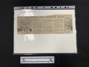 Newspaper clipping with two embedded close up head shots in black and white of the same woman.  One photograph shows her looking serious with her hand to her chin, in the other she is smiling.  There are three columns of text between the photographs.