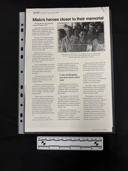 Full magazine page containing one article, three columns of text with a photo that has been photocopied in black and white of a group of people, mostly older women with a middle aged man at the front of the group.