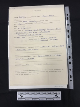 Original completed copied form with many headings that are completed in handwritten blue ink