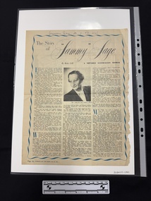 A page from a magazine with a blue border, three columns of text with a portrait black and white photograph near the centre of the page of a woman looking over her left shoulder.