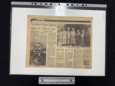 Newspaper clipping of article with seven columns of text, two black and white photographs of older women looking at the camera.