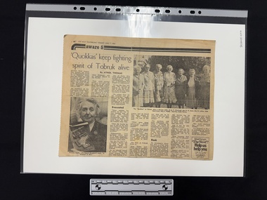 Newspaper clipping of article with seven columns of text, two black and white photographs of older women looking at the camera.