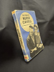 Image of a blue paperback book with black and white photo of a man and woman on the cover