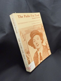 Book with brown text on cover and spine and brown image on cover
