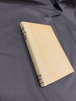 Book has no dustjacket, is bound with olive green book cloth and has black text on the spine