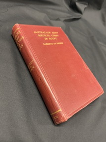 Book has no dustjacket, is bound with dull red book cloth and has gold text on the cover and spine