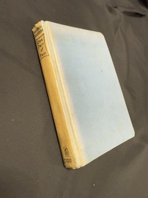 Book has no dustjacket, is bound with blue book cloth and has gold text on the spine