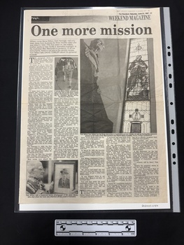 Full page article with three black and white photographs and five columns of text