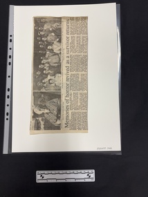 Newspaper clipping of article with two black and white photographs at the top and six columns of text.