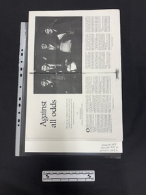 Photocopy of a double page spread of a journal article with a large black and white photograph of four army nurses in uniform, this spread has six columns of text