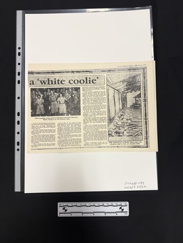 Half page photocopy of part of a newspaper article with three columns of text, a small black and white photograph of a group of women in nurses uniforms and a sketch.