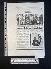 A photocopied news paper clipping of an article with a large black and white photo of a group of women above two columns of text and a smaller black a white photo of two people