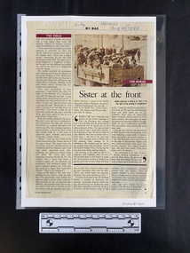 A page from a magazine of an inset story that features a medium black and white photo above two columns of text