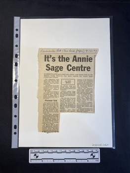 A newspaper clipping of a story with a large title above three columns of text
