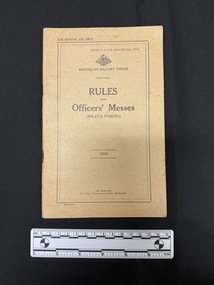 Tan brown staple bound booklet with black ink used for printing on the front cover