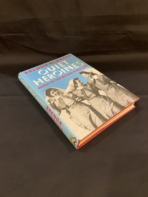 Hardcover book with dust jacket. The dust jacket is light blue with the title printed in white and the author and sub title printed in red. The front cover has the author's name at the top followed by the title in large lettering.  The sub title is beneath in smaller writing. The lower half of the cover shows a black and white image of three female nurses in uniform, happily walking arm in arm.