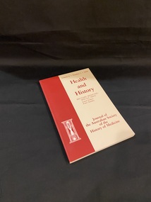 Thin paperback book with red and bone coloured cover. There is a red panel running down the left side of the cover that wraps around the spine, at the bottom of the panel is an hour glass. To the right of the panel the cover is a bone colour with red writing that reads : Volume 6. Number 2. 2004 /Health and History / Military Medicine: / Special issue / Guest editor / Peter Stanley / Journal of the Australian Society of the History of Medicine