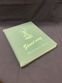 Green hardcover book with title in lighter green writing on the front cover and spine and an image in the same light green of a soldier holding a rifle with his arms held up in victory.  