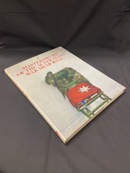 Brown hardcover book with a grey and white dust jacket. The dust jacket shows the title printed across the top of the cover, below which is an image of a green wooden chair with a folded flag on the seat; a military jacket with medals is draped over the back rest and a hat is perched on the corner, there are two military tage hanging on the back.