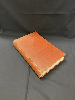 Dark red cloth bound hardcover book without a dust jacket. 