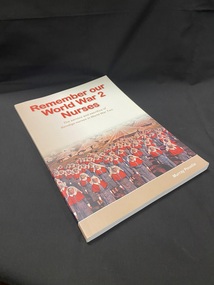 Tan and white paperback book with red, tan and white writing on cover and spine. Cover also has an image of women in army nursing uniforms standing in front of a field of tents