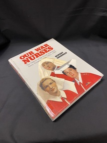 Hardcover book with a light grey cover. The title is printed across the top of the cover in red print, below this is the sub-title in black print. The author's name is in bold black print to the right, below the heading. The lower two thirds of the cover are filled with an image of three nurses in white uniforms and bright red capes.