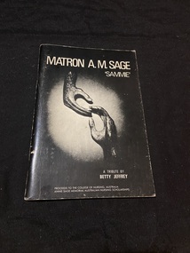 Stapled booklet with black cover. Title and authors name are printed in white on the front cover along with phograph of a sculpture of two hands reaching towards each other ['hands' by Henry Moore].