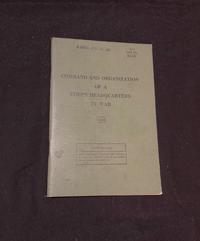 Green stapled booklet with the stile printed in black ink across the front. The year 1950 appears with a line above and below it, underneath the title. The lower part of the cover shows a rectangle box with the words 'RESTRICTED. The information given in this document is not to be communicated, either directly or indirectly, to the Press or to any person not authorized to receice it' in black ink. The top right corner displays 'WO CODE No. 8618' printed in black ink. There is also a purple stamp reading 'AGRA (FD) SIG SON', stamped across the top of the cover.
