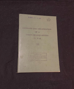 Green stapled booklet with the stile printed in black ink across the front. The year 1950 appears with a line above and below it, underneath the title. The lower part of the cover shows a rectangle box with the words 'RESTRICTED. The information given in this document is not to be communicated, either directly or indirectly, to the Press or to any person not authorized to receice it' in black ink. The top right corner displays 'WO CODE No. 8618' printed in black ink. There is also a purple stamp reading 'AGRA (FD) SIG SON', stamped across the top of the cover.