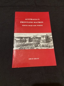 Red booklet with two staples down the side. Title is printed in white text across the top half of the cover. A black and white image of a military hospital building is in a rectangle strip across the middle. At the bottom of the page, the author's name is printed in white capital letters.