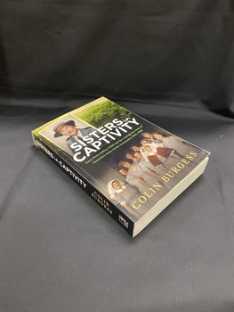 Title is printed across the middle of the cover in large white text, followed by the sub title in smaller green print below. There is a photo of Sister Betty Jeffrey in the top left corner and the bottom half of the page shows an image of a group of ten nurses posing for a photo. The background of the cover is dense green jungle.