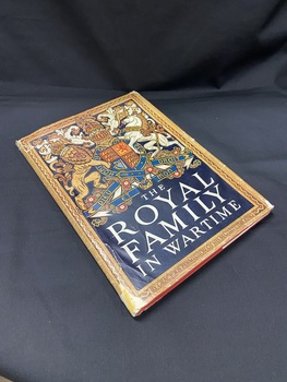 Red clothbound, hardcover book with dustjacket. The dustjacket is brown and has the title printed in black lettering along the spine. The front shows an ornate border with the words 'by gracious permission of His Majesty the King' printed inside the bottom border. The rest of the page has a large coloured coat of arms of the royal family and below that on a black background, the title is printed in white text. 